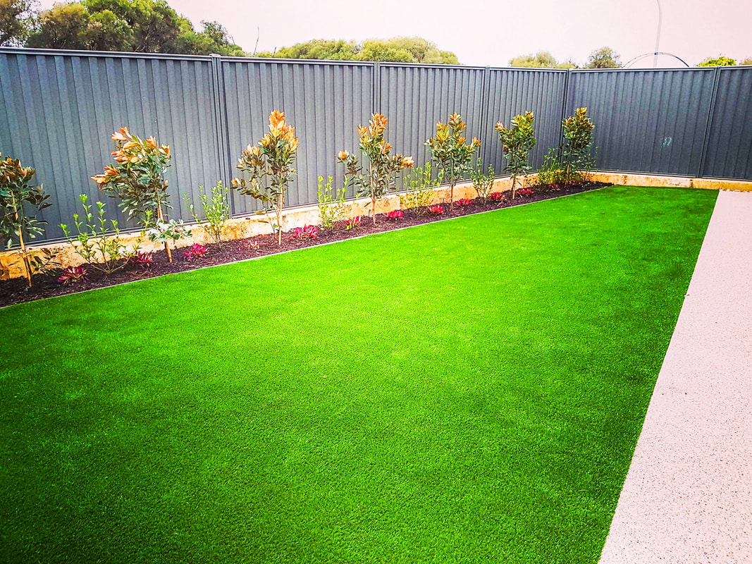 The house is at outdoor Artificial Lawn